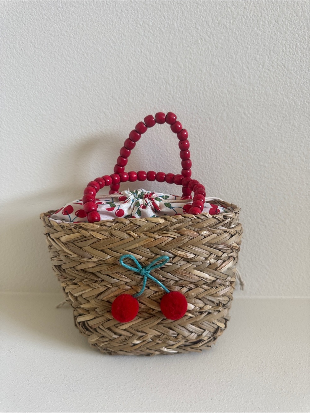 Straw Cherry-Accent Handbag with Red Beaded Handles (Designed in France)